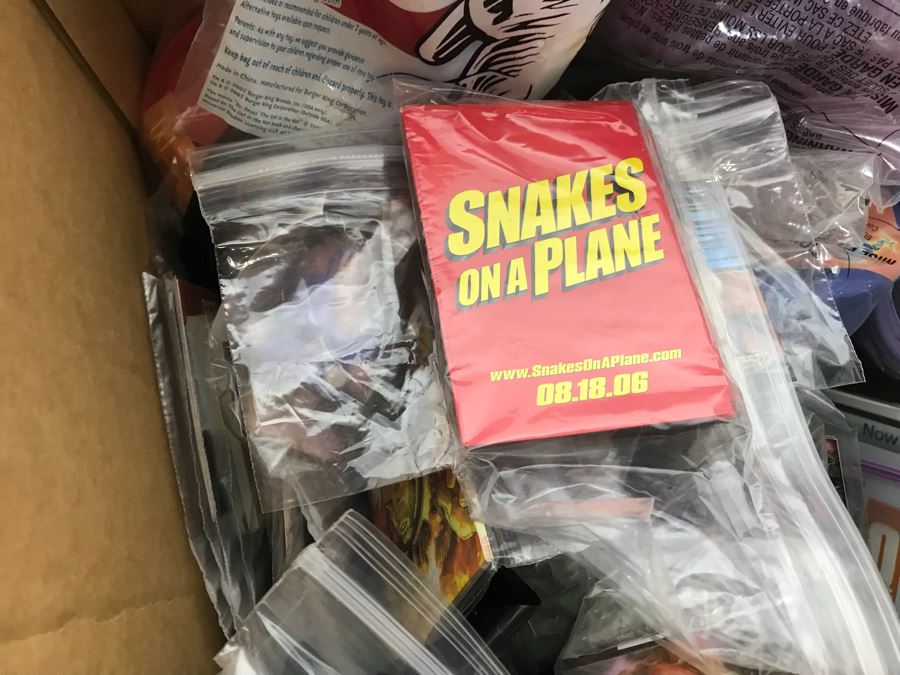 (3) Large Boxes Filled With Various McDonalds And Burger King Happy Meal Toys, Christmas Ornaments, Trading Cards Including Pokemon, PEZ Dispensers - See All Photos [Photo 27]
