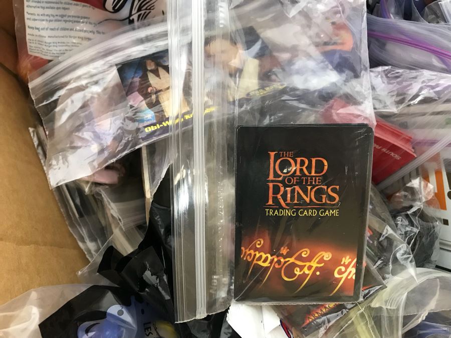 (3) Large Boxes Filled With Various McDonalds And Burger King Happy Meal Toys, Christmas Ornaments, Trading Cards Including Pokemon, PEZ Dispensers - See All Photos [Photo 24]