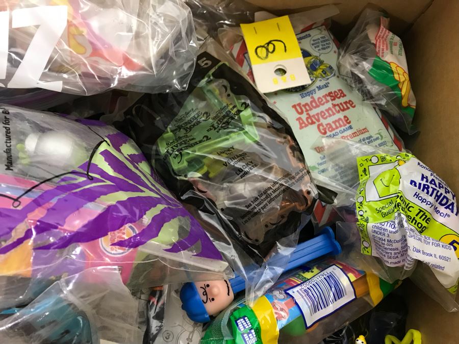 (3) Large Boxes Filled With Various McDonalds And Burger King Happy Meal Toys, Christmas Ornaments, Trading Cards Including Pokemon, PEZ Dispensers - See All Photos [Photo 54]