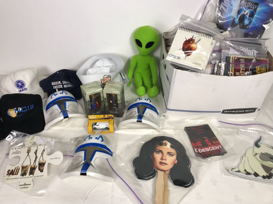 Huge Lot Of Various TV Series And Movie Promotional Hats, Ghost Hunters Toy Figurines, Alien Doll, Tons Of Beowulf Sealed Promotional Pins, Promotional Buttons And Patches, Movie Promo Cards From Comic Con - See All Photos [Photo 1]