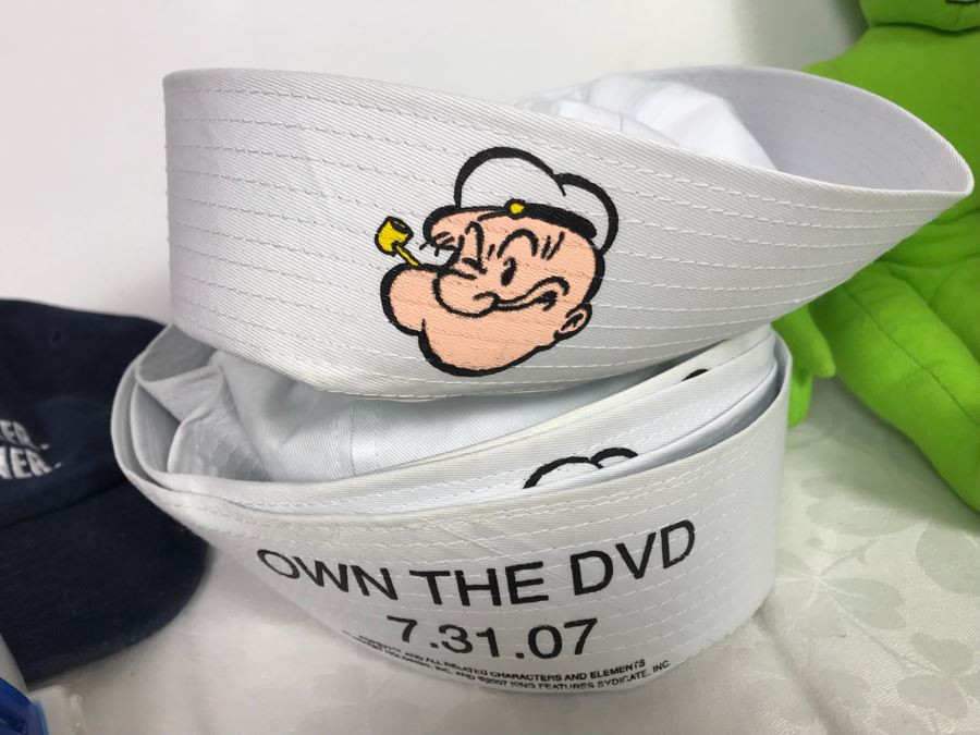 Huge Lot Of Various TV Series And Movie Promotional Hats, Ghost Hunters Toy Figurines, Alien Doll, Tons Of Beowulf Sealed Promotional Pins, Promotional Buttons And Patches, Movie Promo Cards From Comic Con - See All Photos [Photo 14]