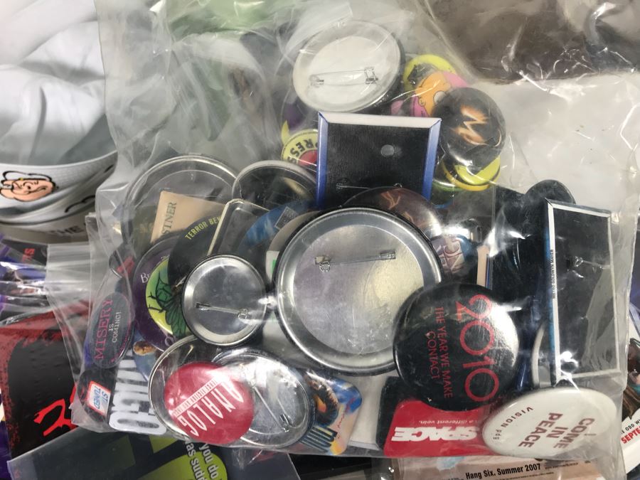 Huge Lot Of Various TV Series And Movie Promotional Hats, Ghost Hunters Toy Figurines, Alien Doll, Tons Of Beowulf Sealed Promotional Pins, Promotional Buttons And Patches, Movie Promo Cards From Comic Con - See All Photos [Photo 44]