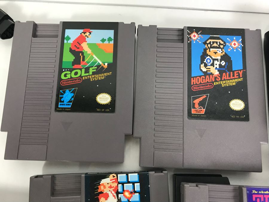 (11) Vintage Nintendo Video Games Incl California Games, Top Gun, Tetris, Thrilla's Surfari And Game Genie Video Game Enhancer With (4) Nintendo Video Game Controllers [Photo 9]