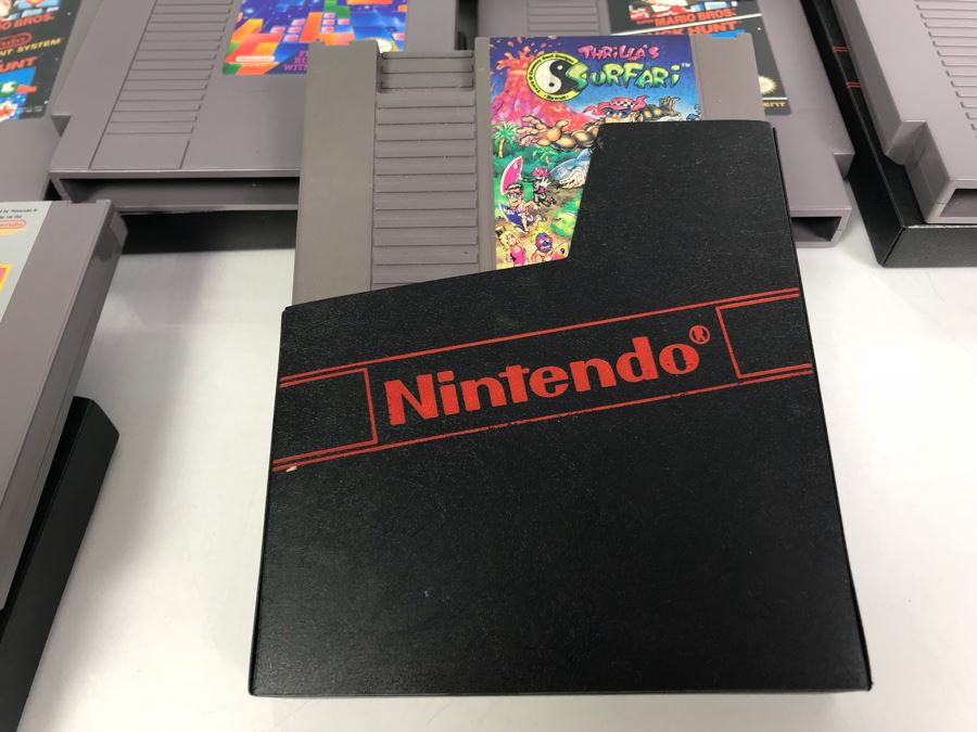 (11) Vintage Nintendo Video Games Incl California Games, Top Gun, Tetris, Thrilla's Surfari And Game Genie Video Game Enhancer With (4) Nintendo Video Game Controllers [Photo 18]