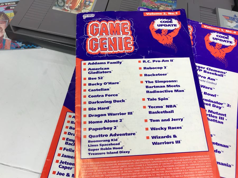 (11) Vintage Nintendo Video Games Incl California Games, Top Gun, Tetris, Thrilla's Surfari And Game Genie Video Game Enhancer With (4) Nintendo Video Game Controllers [Photo 16]