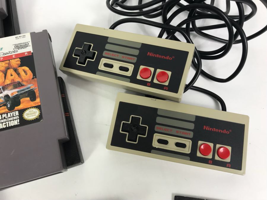 (11) Vintage Nintendo Video Games Incl California Games, Top Gun, Tetris, Thrilla's Surfari And Game Genie Video Game Enhancer With (4) Nintendo Video Game Controllers [Photo 12]