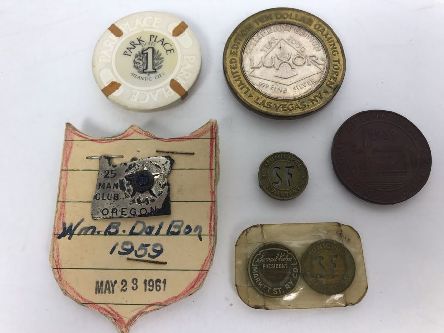 Various Tokens And Pins: LUXOR .999 Fine Silver Year 2000 $10 Gambling Token, Vintage 1939 Golden Gate International Exposition Treasure Island, SF Trolley Tokens And Oregon Man Club Pin [Photo 1]