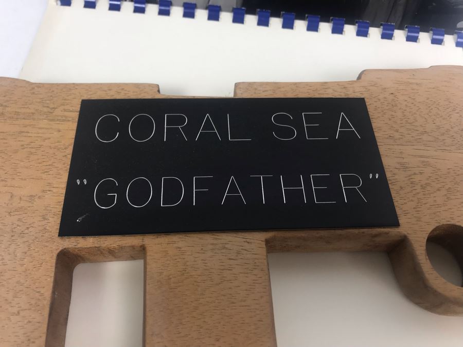 Carved Wooden Gun With Inscription 'Coral Sea Godfather' And Photograph Book Titled 'To The Coral Sea Godfather From The Coral Sea Family' Recognizing William H. Harris, RADM, USN (Ret.) [Photo 4]