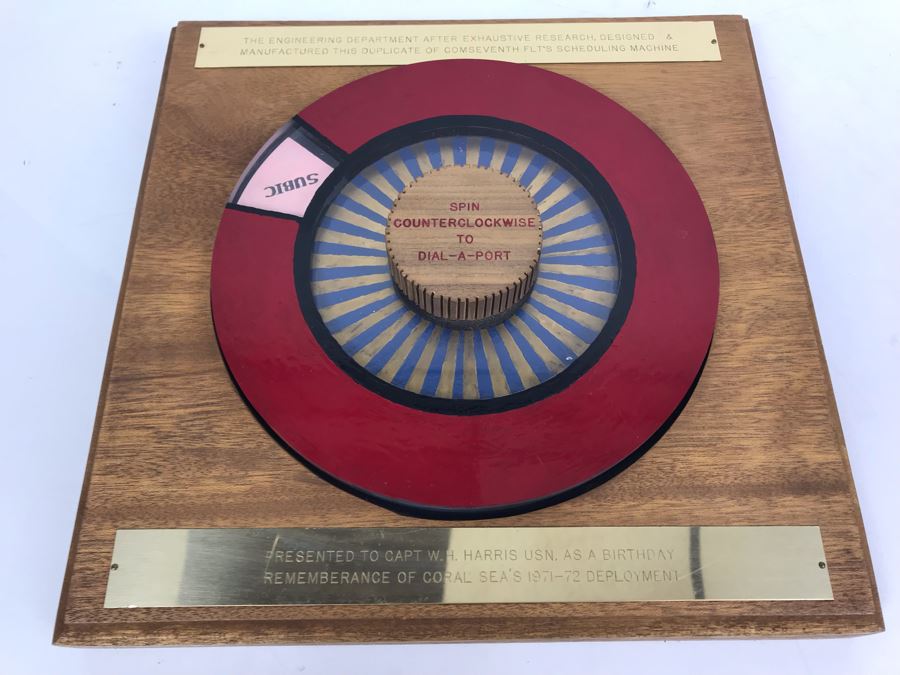 Mechanical Award Presented To Capt W. H. Harris USN For Rememberance Of Coral Sea's 1971-1972 Deployment - COMSEVENTH FLT'S Scheduling Machine Spin To Dial-A-Port [Photo 1]