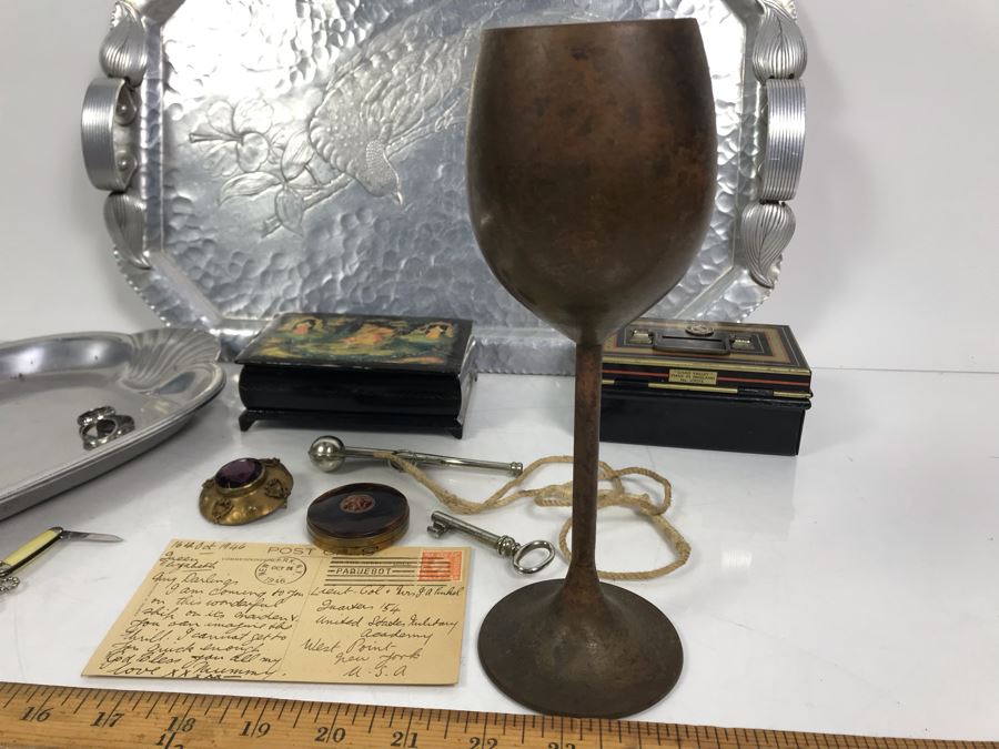 Vintage Lot Featuring An English Boatswain Whistle, Hand Wrought Bird Tray, 1946 Maiden Voyage Postcard Of Queen Elizabeth Ship, Vintage Brooch Pin, Ladies Compact, 3 Rings, Lacquer Box, Metal Box, Token, Copper Chalice And Mini Pocket Knife - See Photos [Photo 23]