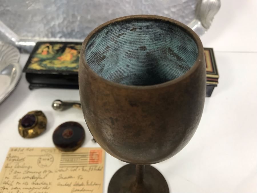 Vintage Lot Featuring An English Boatswain Whistle, Hand Wrought Bird Tray, 1946 Maiden Voyage Postcard Of Queen Elizabeth Ship, Vintage Brooch Pin, Ladies Compact, 3 Rings, Lacquer Box, Metal Box, Token, Copper Chalice And Mini Pocket Knife - See Photos [Photo 24]