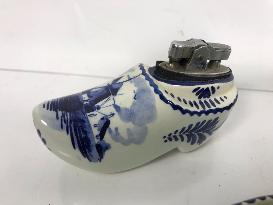 Delfts Blue Holland Pottery Lot: Includes (3) Clog Shoe Ashtrays, (1) Clog Shoe, (1) Clog Shoe Lighter And (1) Cow Creamer [Photo 7]