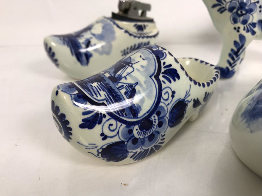 Delfts Blue Holland Pottery Lot: Includes (3) Clog Shoe Ashtrays, (1) Clog Shoe, (1) Clog Shoe Lighter And (1) Cow Creamer [Photo 6]