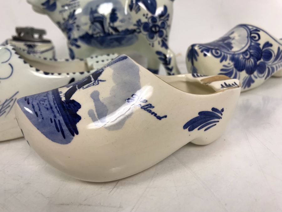 Delfts Blue Holland Pottery Lot: Includes (3) Clog Shoe Ashtrays, (1) Clog Shoe, (1) Clog Shoe Lighter And (1) Cow Creamer [Photo 2]