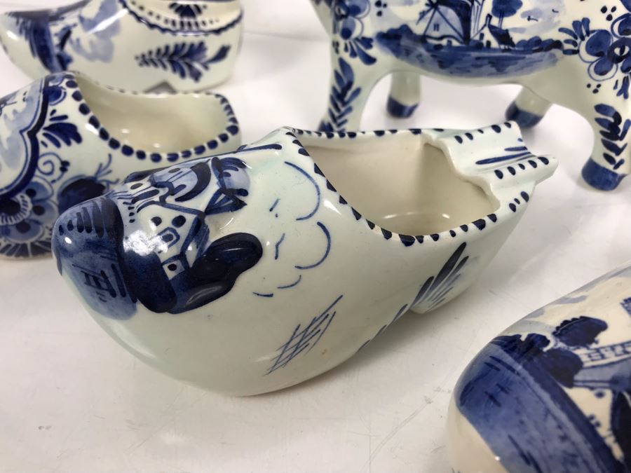 Delfts Blue Holland Pottery Lot: Includes (3) Clog Shoe Ashtrays, (1) Clog Shoe, (1) Clog Shoe Lighter And (1) Cow Creamer [Photo 4]