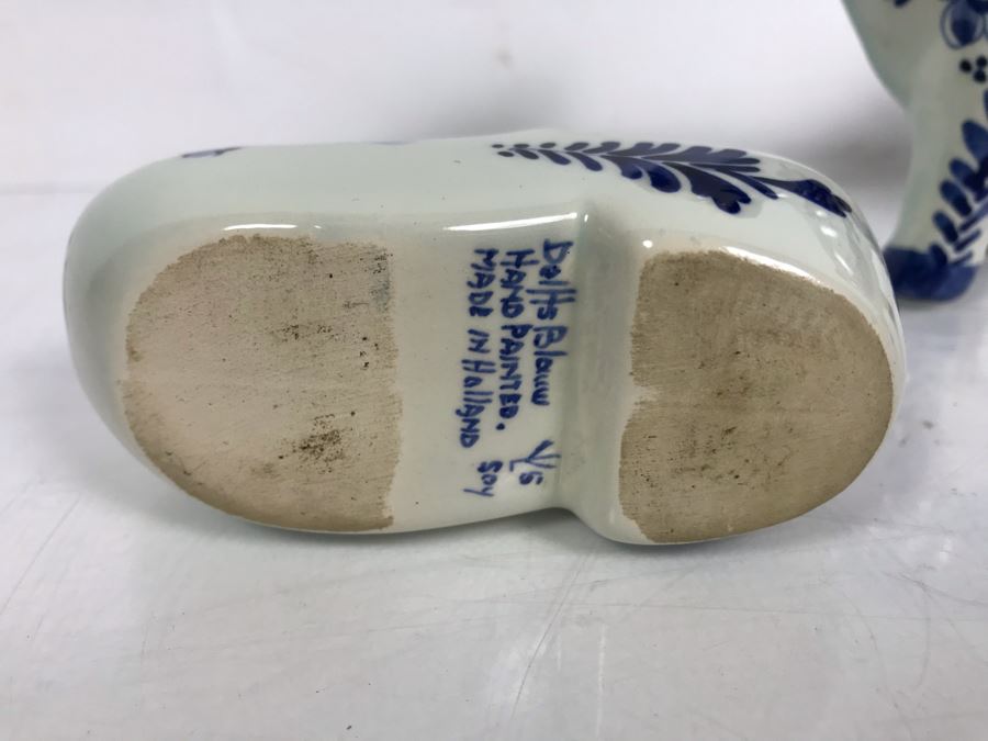 Delfts Blue Holland Pottery Lot: Includes (3) Clog Shoe Ashtrays, (1) Clog Shoe, (1) Clog Shoe Lighter And (1) Cow Creamer [Photo 14]