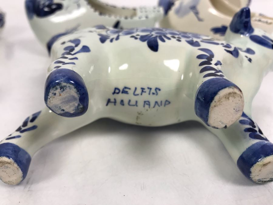 Delfts Blue Holland Pottery Lot: Includes (3) Clog Shoe Ashtrays, (1) Clog Shoe, (1) Clog Shoe Lighter And (1) Cow Creamer [Photo 15]