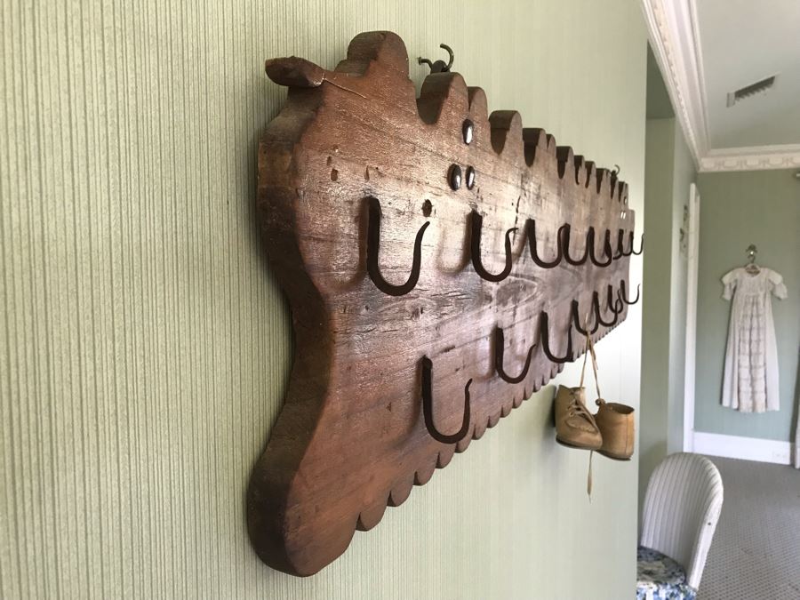 Antique Wall Mounted Rack With (15) Metal Hooks 50'W X 11'H [Photo 4]