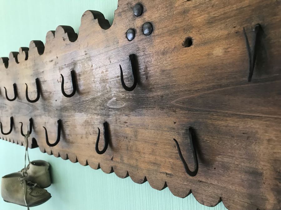 Antique Wall Mounted Rack With (15) Metal Hooks 50'W X 11'H [Photo 10]