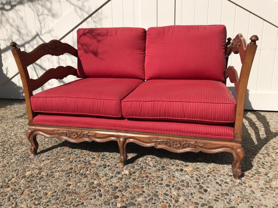 Stunning Wooden Loveseat With Red Upholstered Cushions