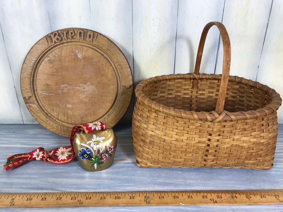 Antique Carved Wooden Bread Plate, Vintage Woven Basket And Hand Painted Brass Swiss Cow Bell [Photo 1]