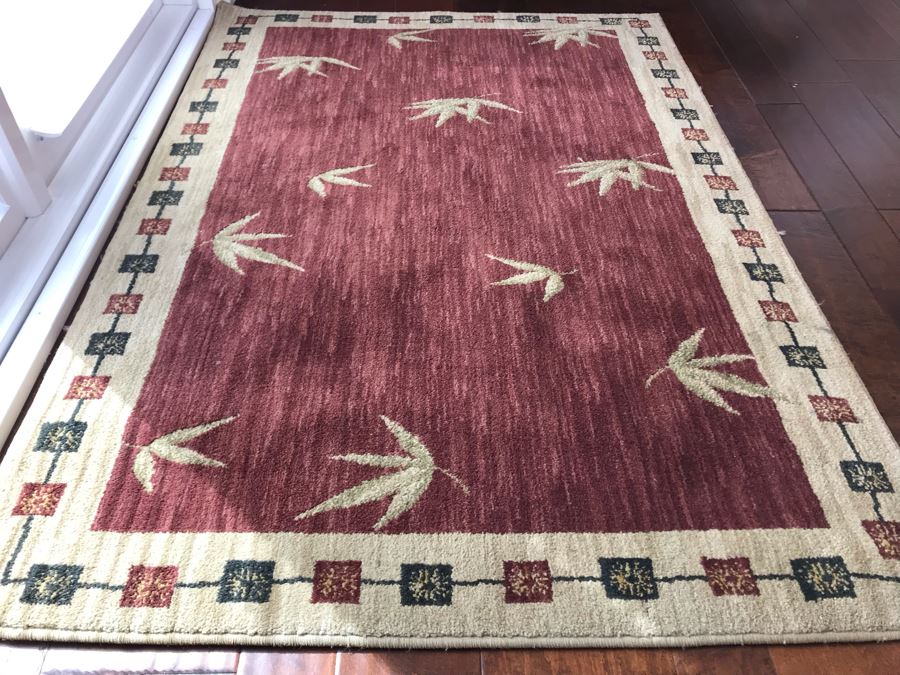 Synthetic Area Rug 45'W X 65'H [Photo 1]