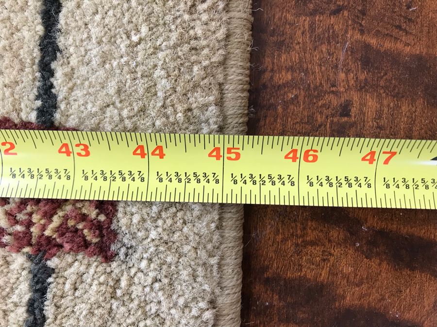 Synthetic Area Rug 45'W X 65'H [Photo 4]