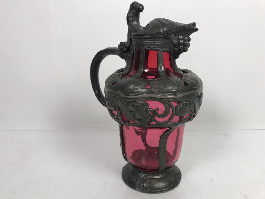 JUST ADDED - Pewter Overlay Ruby Glass Pitcher Featuring Grape Motif With Monkey Perched On Hinged Lid 10'H