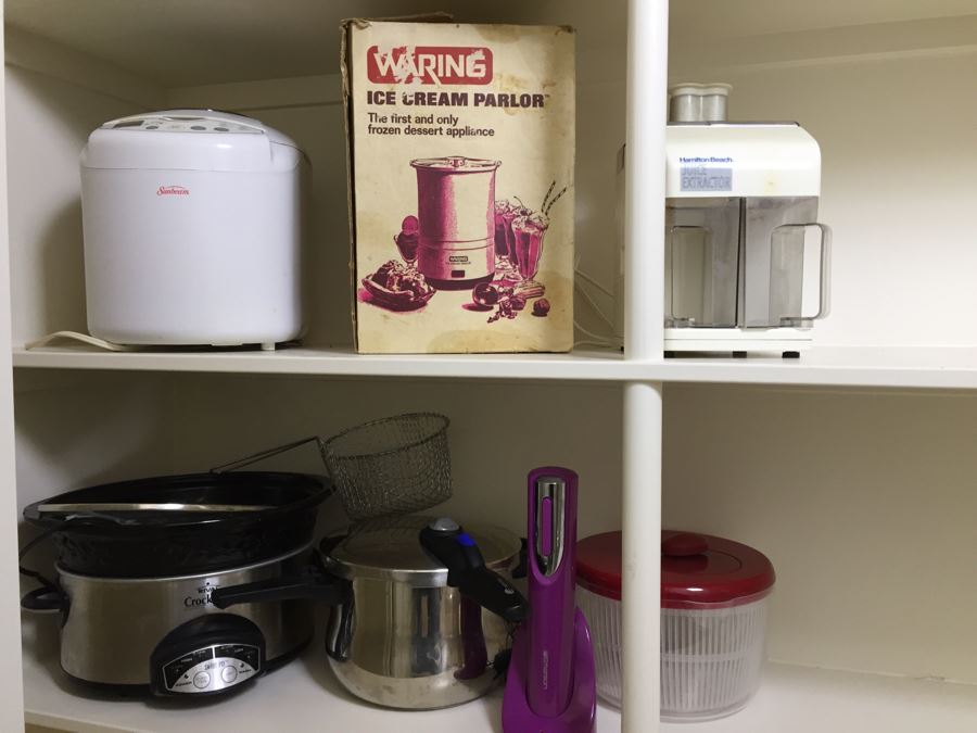 Just Added - (2) Shelves Of Kitchen Appliances And Items Including Sunbeam Breadmaker, Waring Ice Cream Parlor, Hamilton Beach Juice Extractor, Crock Pot - See Photos [Photo 1]