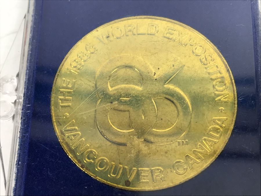 Collectibles Lot With Walt Disney World Glass Tray And Souvenier Book, Michael Jackson Button, Base Metal Ring, (6) Vancouver Canada 1986 World Exposition Medallions And More - See Photos [Photo 4]