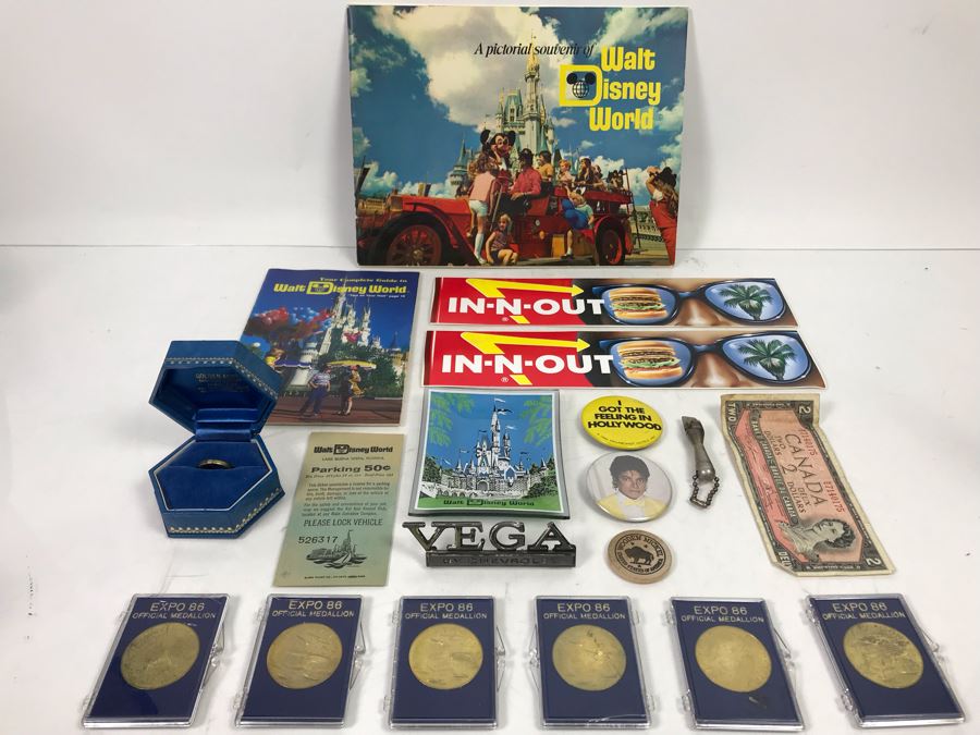 Collectibles Lot With Walt Disney World Glass Tray And Souvenier Book, Michael Jackson Button, Base Metal Ring, (6) Vancouver Canada 1986 World Exposition Medallions And More - See Photos