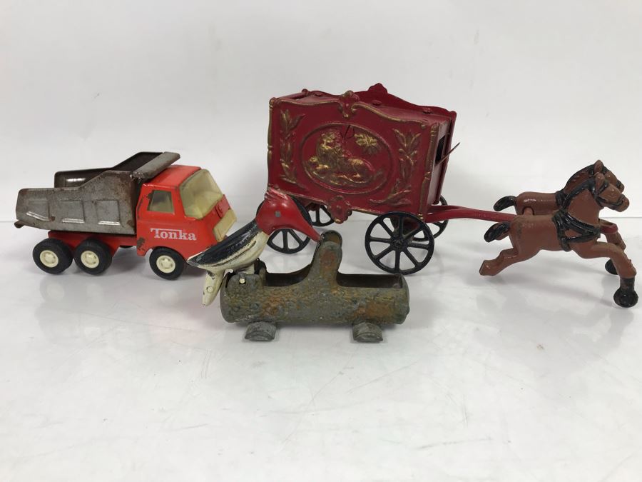 Old Mini Tonka Truck, Vintage Metal Woodpecker Toothpick Grabber Holder And Cast Iron Horse Pulling Circus Wagon [Photo 1]