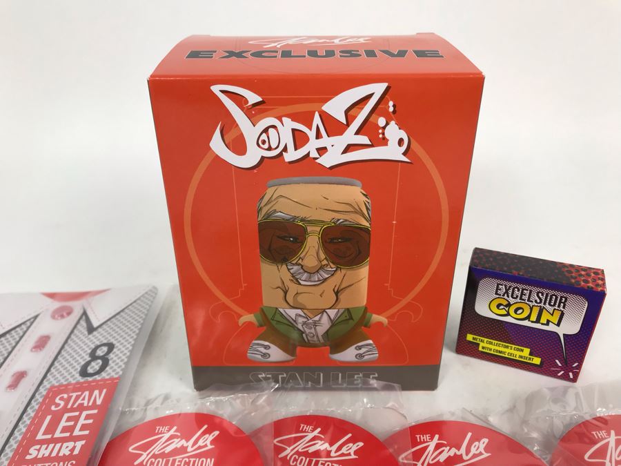 Collection Of Various Stan Lee Collection Items Including Stan Lee Shirt Buttons, Exclusive Stan Lee Figure SodaZ By ByGeorge! Art By Francisco Herrera, (4) Excelsior Stan Lee Buttons, (4) Excelsior Stan Lee Pins And Stan Lee Excelsior Coin [Photo 3]