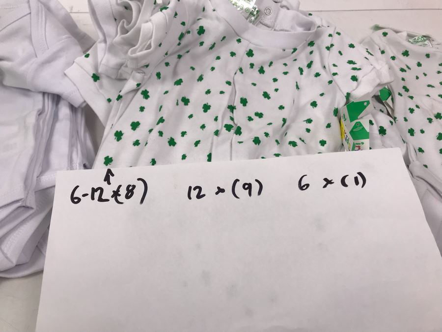 (18) Irish Baby Bodysuits (8) 6-12 Months, (9) 12 Months, (1) 6 Months Retails $324 [Photo 10]
