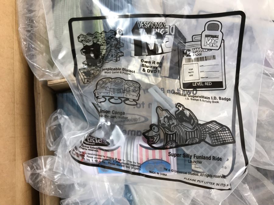 Box Loaded With Carl's Jr Despicable Me Movie Promotional Happy Meal Toys - See Photos [Photo 13]