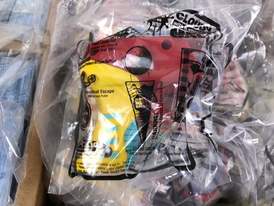Box Loaded With Carl's Jr Cloudy With A Chance Of Meatballs Movie Promotional Happy Meal Toys - See Photos [Photo 11]