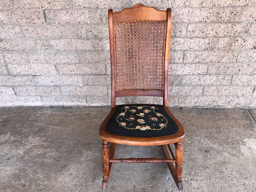 Antique Child's Doll Rocking Chair With Needlepoint Seat And Cane Back [Photo 1]