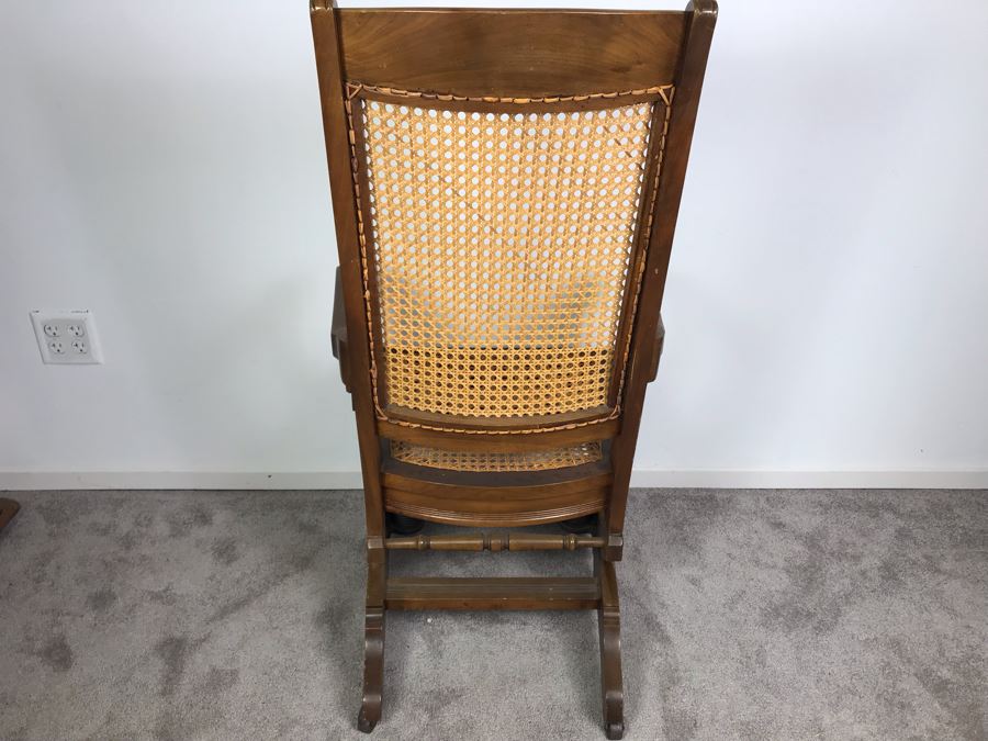 Antique Eastlake Cane Rocking Chair On Metal Casters [Photo 10]