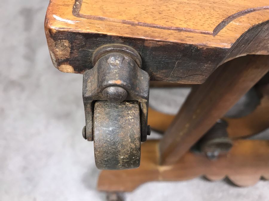Antique Eastlake Cane Rocking Chair On Metal Casters [Photo 12]