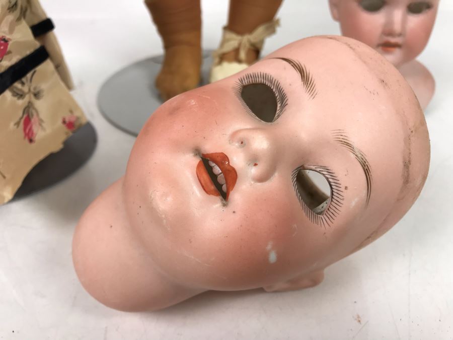Vintage 24' Armand Marseille German Doll With Stand (C), Armand Marseille German Doll Head (R), E&S German Doll With Stand W/O Arms (L), Heubach Koppelsdorf German Doll Head (C) [Photo 22]
