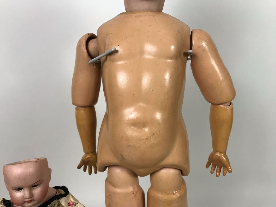 Vintage 24' Armand Marseille German Doll With Stand (C), Armand Marseille German Doll Head (R), E&S German Doll With Stand W/O Arms (L), Heubach Koppelsdorf German Doll Head (C) [Photo 10]