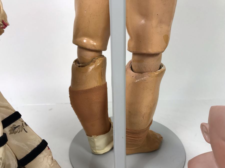 Vintage 24' Armand Marseille German Doll With Stand (C), Armand Marseille German Doll Head (R), E&S German Doll With Stand W/O Arms (L), Heubach Koppelsdorf German Doll Head (C) [Photo 15]