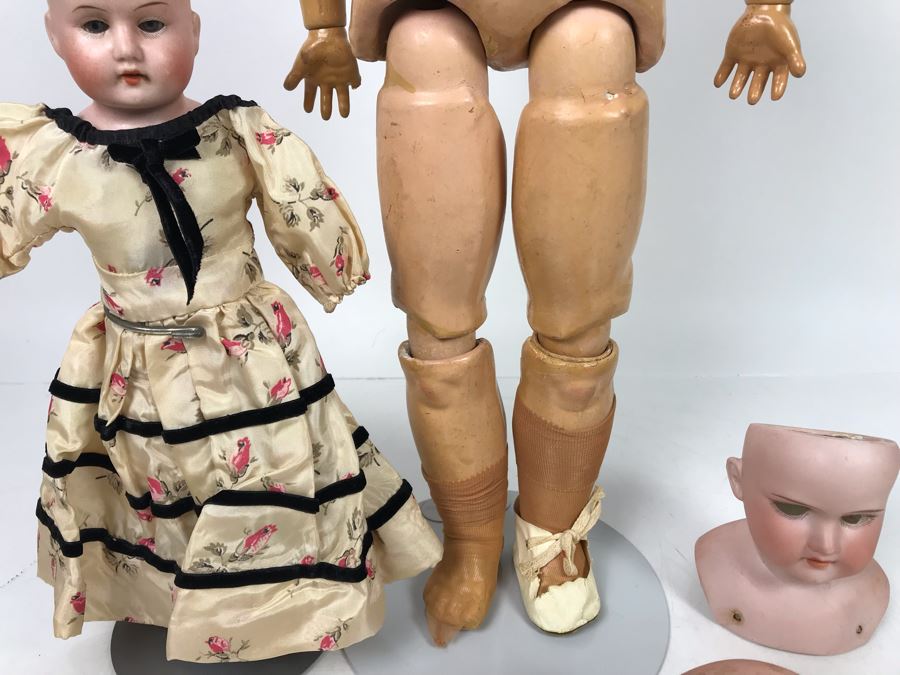 Vintage 24' Armand Marseille German Doll With Stand (C), Armand Marseille German Doll Head (R), E&S German Doll With Stand W/O Arms (L), Heubach Koppelsdorf German Doll Head (C) [Photo 11]
