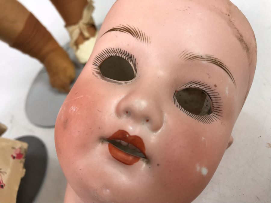 Vintage 24' Armand Marseille German Doll With Stand (C), Armand Marseille German Doll Head (R), E&S German Doll With Stand W/O Arms (L), Heubach Koppelsdorf German Doll Head (C) [Photo 23]