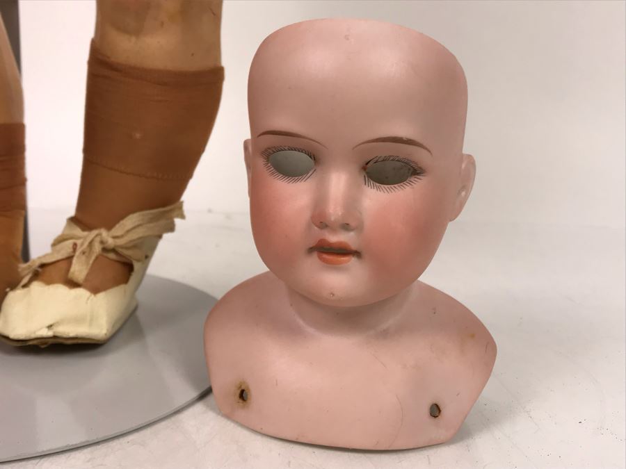 Vintage 24' Armand Marseille German Doll With Stand (C), Armand Marseille German Doll Head (R), E&S German Doll With Stand W/O Arms (L), Heubach Koppelsdorf German Doll Head (C) [Photo 28]