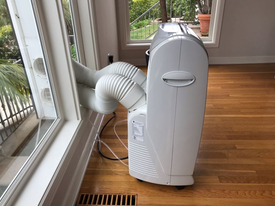 Friedrich Portable 4-In-One Air Conditioner/Heater/Dehumidifier/Fan Model PH14B Retails $849.00