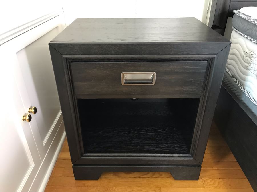 Pair Of Aspenhome Front Street Black Wooden Nightstands With Metal Pulls 22W X 16.5D X 22.5H Retails For $1,140 [Photo 1]