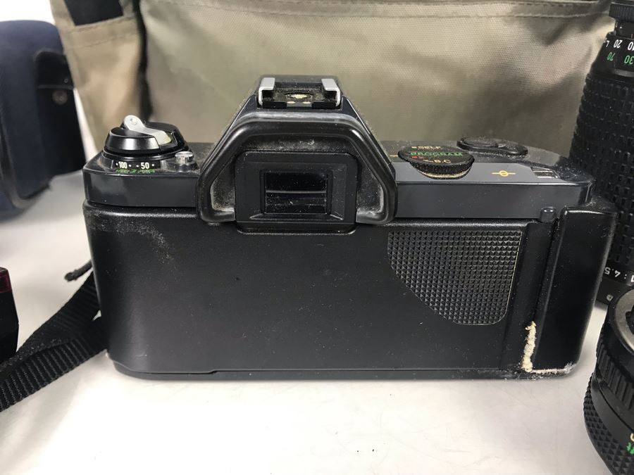 JUST ADDED - Canon Photography Lot Featuring Canon T50 Camera, Flash, Three Canon Camera Lenses, Filters And Camera Bag [Photo 5]