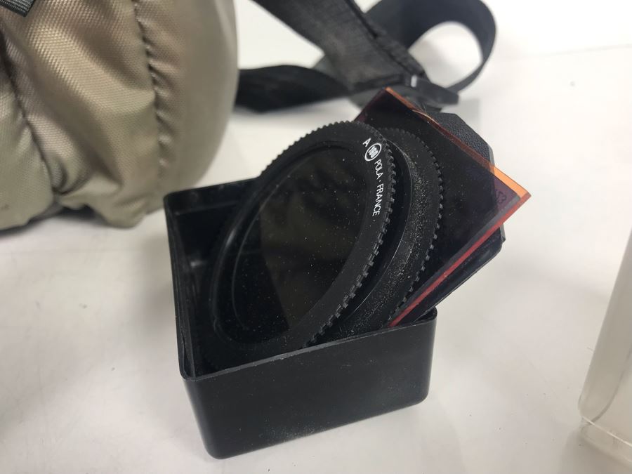 JUST ADDED - Canon Photography Lot Featuring Canon T50 Camera, Flash, Three Canon Camera Lenses, Filters And Camera Bag [Photo 14]