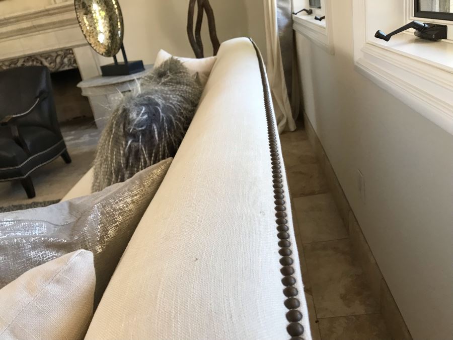 Classy Contemporary White Cream Sofa With Brass Nailheads And Five Throw Pillows 8'W X 37'D X 35'H [Photo 6]